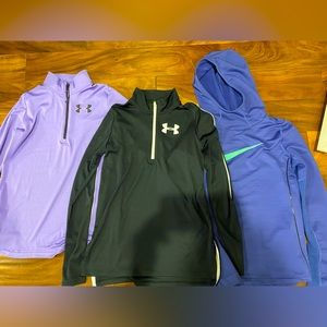 3 girls hoodies/pullovers. Youth size large. 2 UA quarter zips and 1 Nike hoodie